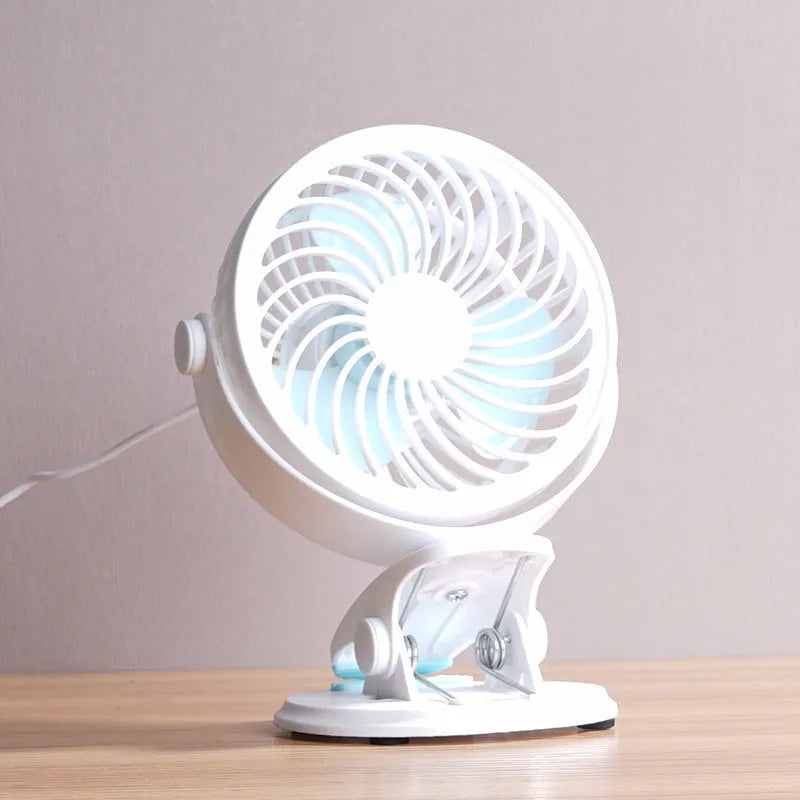 USB-powered desk fan with clip and floor positioning options, showing compact 19cm design