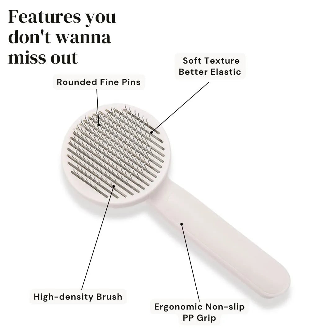 Blue self-cleaning slicker brush for dogs and cats on a white background, showing ergonomic rubber handle.