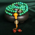 Natural turquoise bracelet with 108 round polished 8mm beads on a string.