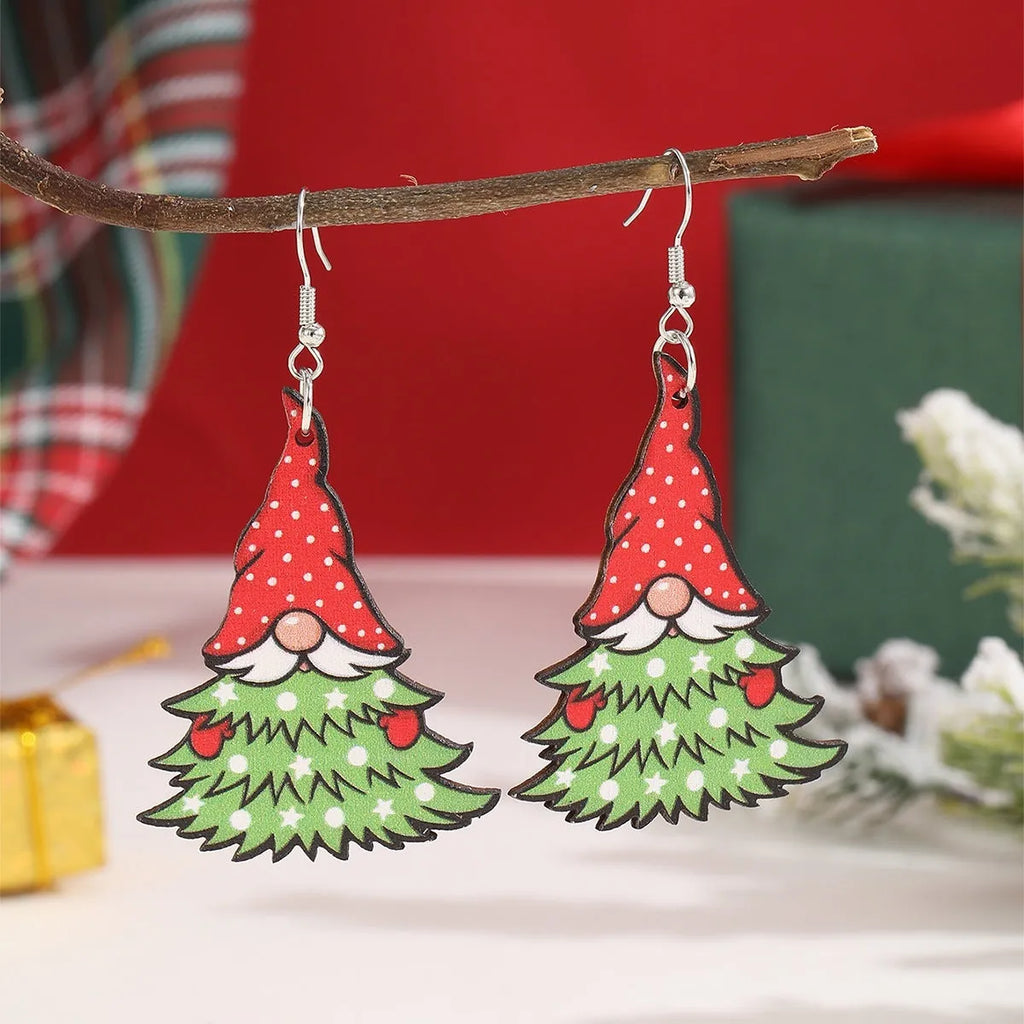 Printed wooden Christmas earrings with geometric Santa Claus designs in red and green