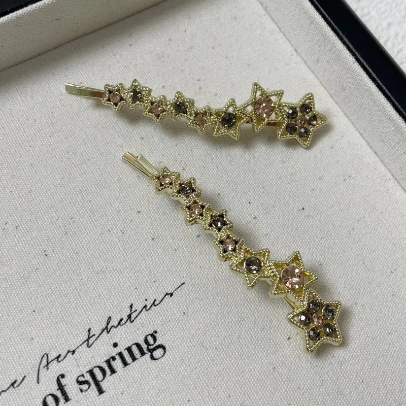 Gold alloy hair barrette with five-pointed star decoration for women's hairstyling
