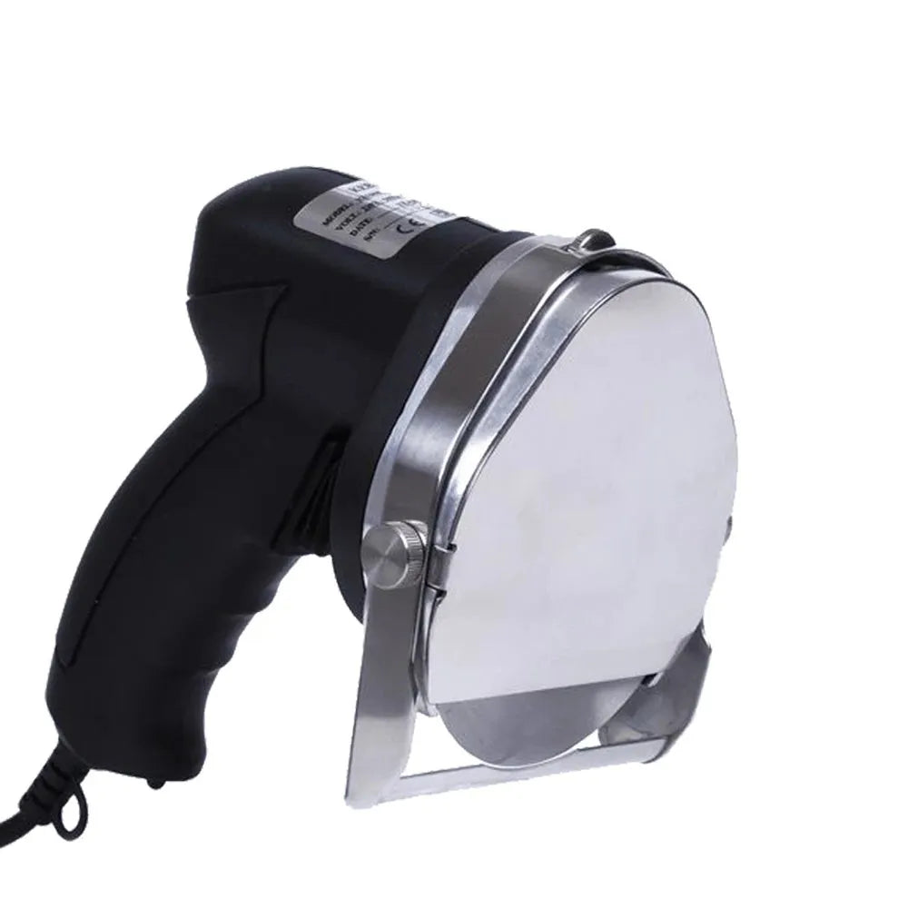 Black electric meat cleaver machine with EU plug and included cleaver accessory on a countertop.