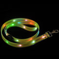 Bright orange luminous PVC dog lead and adjustable collar set shown coiled, 120cm long.