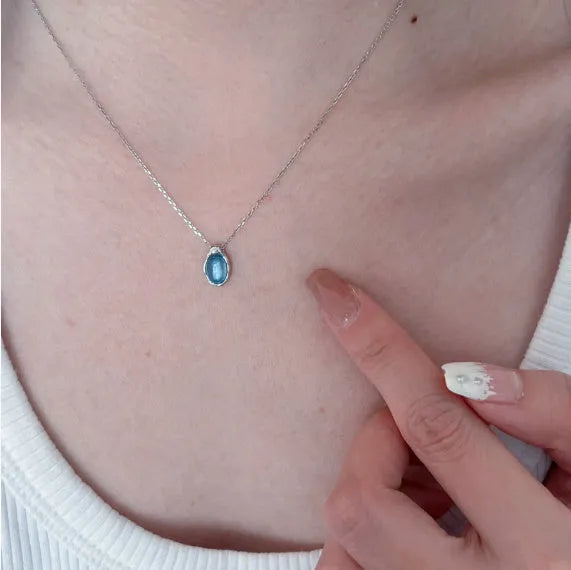 Navy blue water drop pendant necklace with geometric copper pendant on adjustable chain