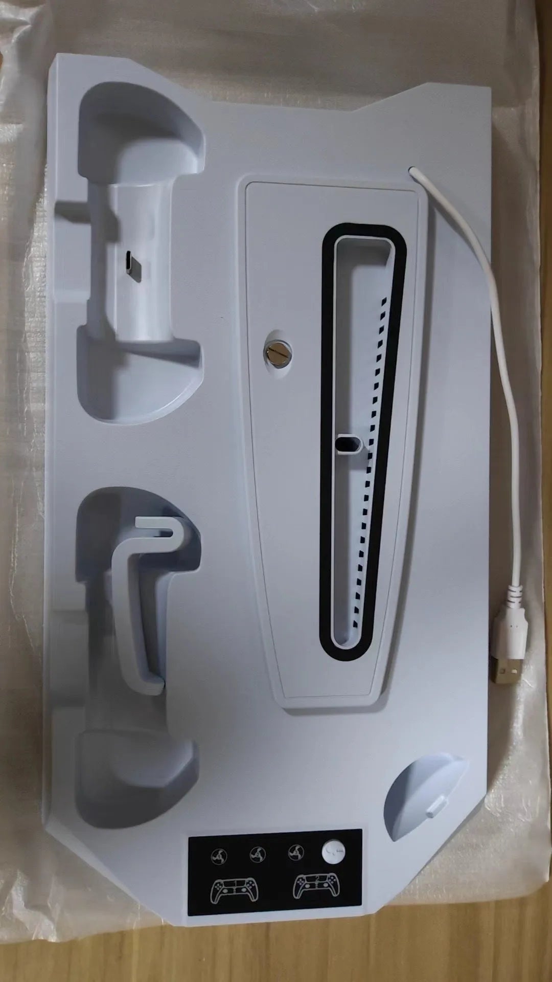 PS5 charging cooling station with dual controller docks and headphone hook in black or white