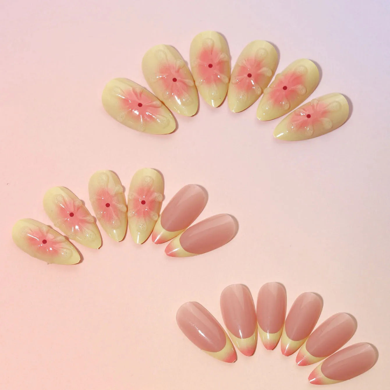 Cartoon 3D flower design on plastic fake nail armour pieces from a detachable nail kit.