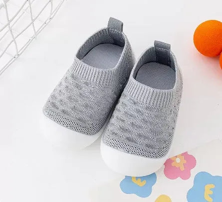 Baby soft sole non-slip walking shoes with breathable cotton upper and natural rubber sole in multiple colours