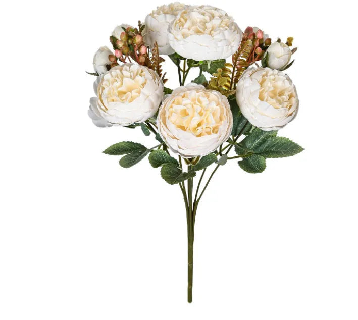 Silk artificial peony bouquet arrangement in champagne colour for home or wedding decor.