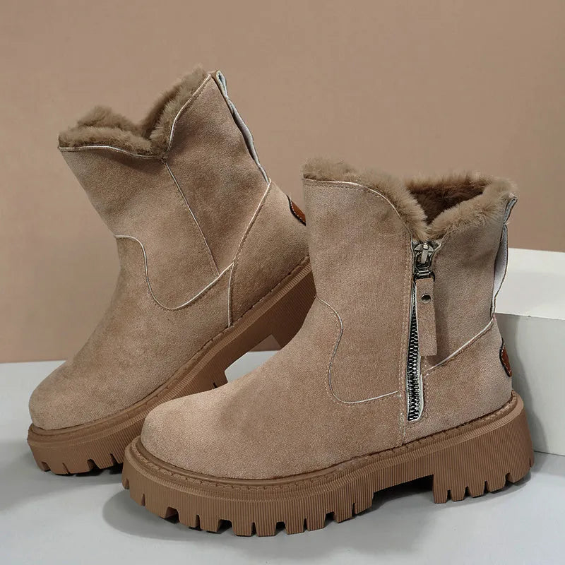Women's black faux suede high-top snow boots with side zipper and thick plush lining.