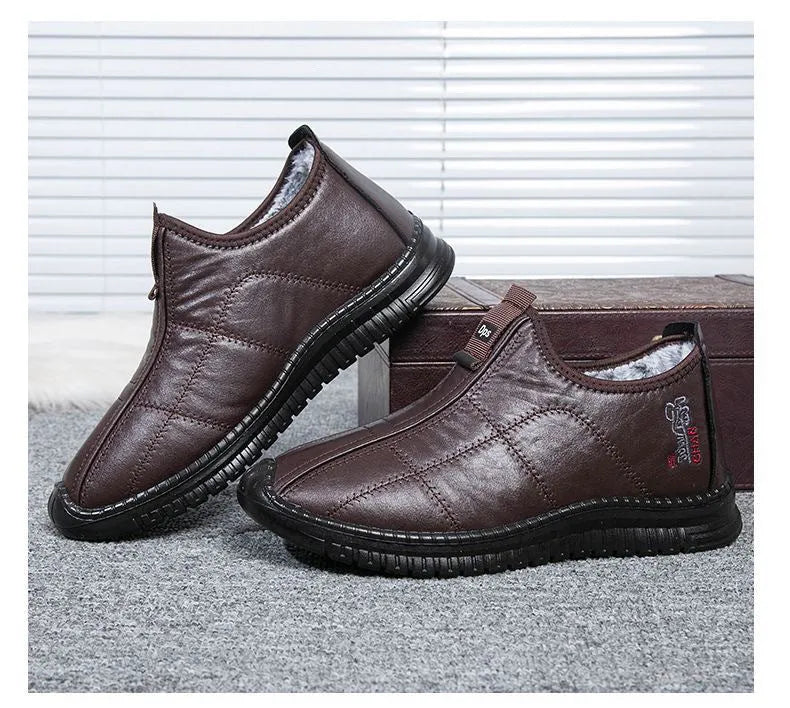 Men's brown winter cotton boots with a buckle fastening and a thick sole.