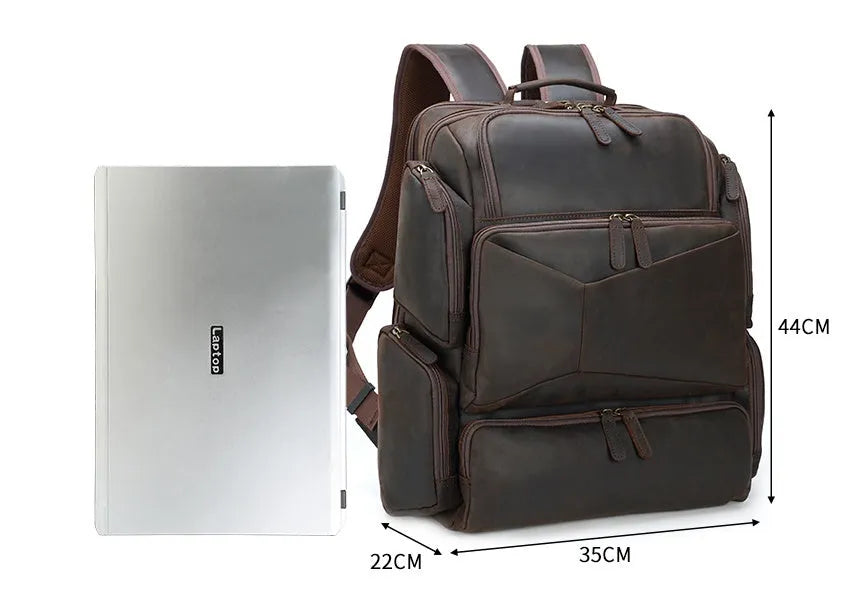 Dark brown Retro Crazy Horse leather backpack for a 17-inch laptop, showing embossed details and double straps.