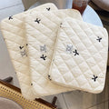 Nylon laptop storage bag with embroidered rhombus bow in light pink colour