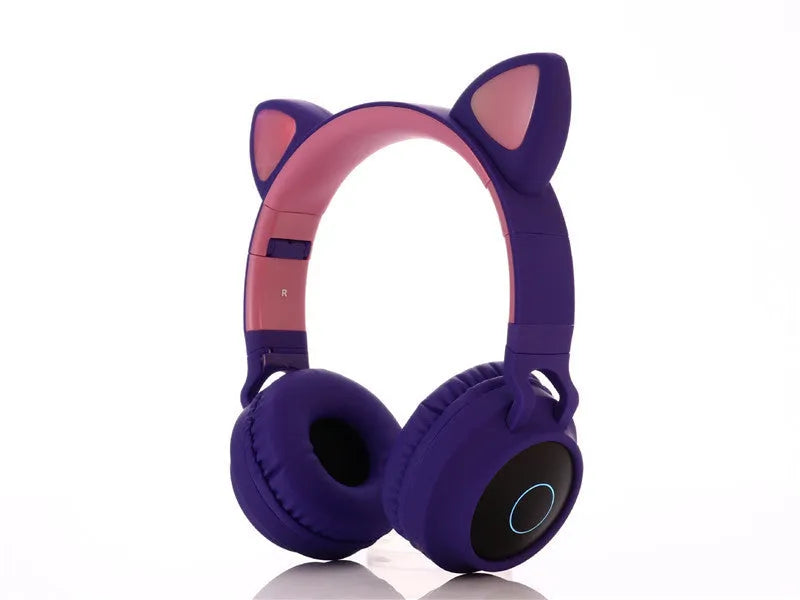 Pink cartoon cat ear wireless Bluetooth gaming headset showing head-mounted design with bilateral ear cups