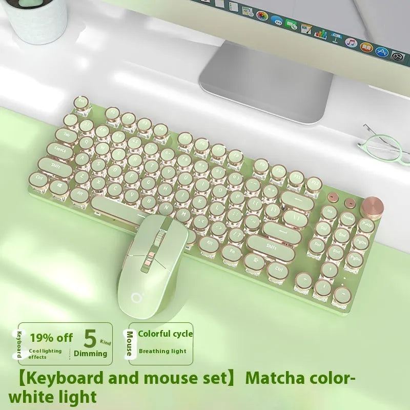 Matcha green mechanical gaming keyboard with multifunction knob on a desk