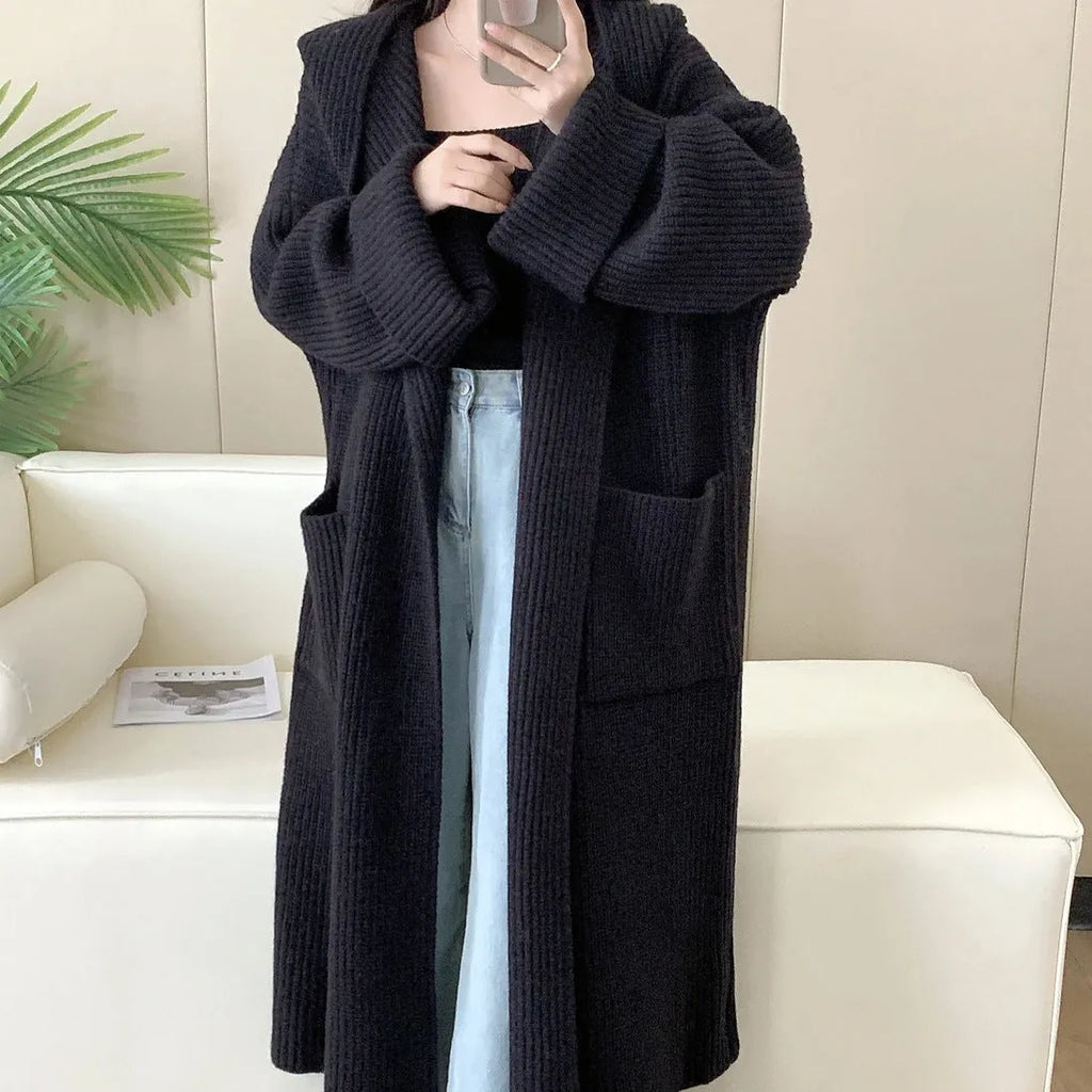 Loose hooded acrylic cardigan coat for women in beige colour with 80cm length and raglan sleeves
