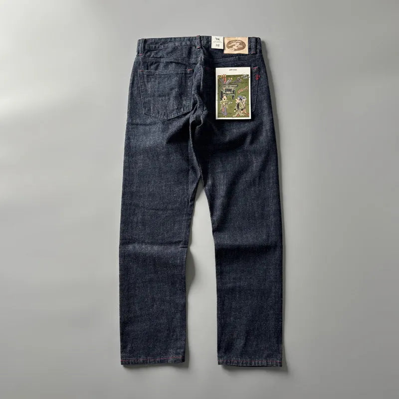 Men's straight leg cotton denim jeans in a primary colour, shown on a mid-waist fit model.