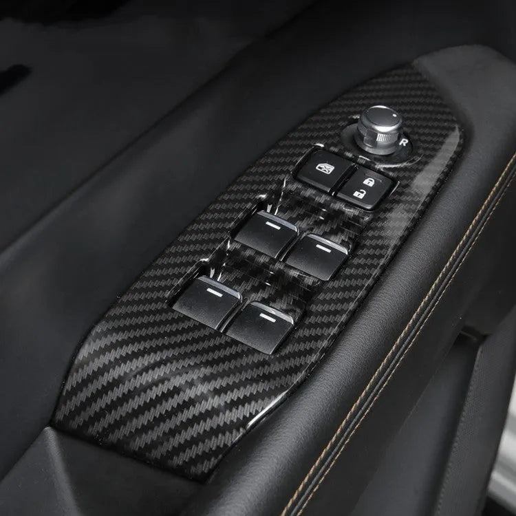 Pair of black ABS plastic steering wheel frame decoration panels for car interior trim.