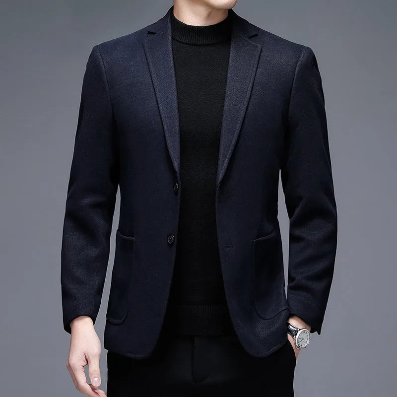 Men's solid colour loose fit winter jacket in grey, shown with long sleeves and round hem.
