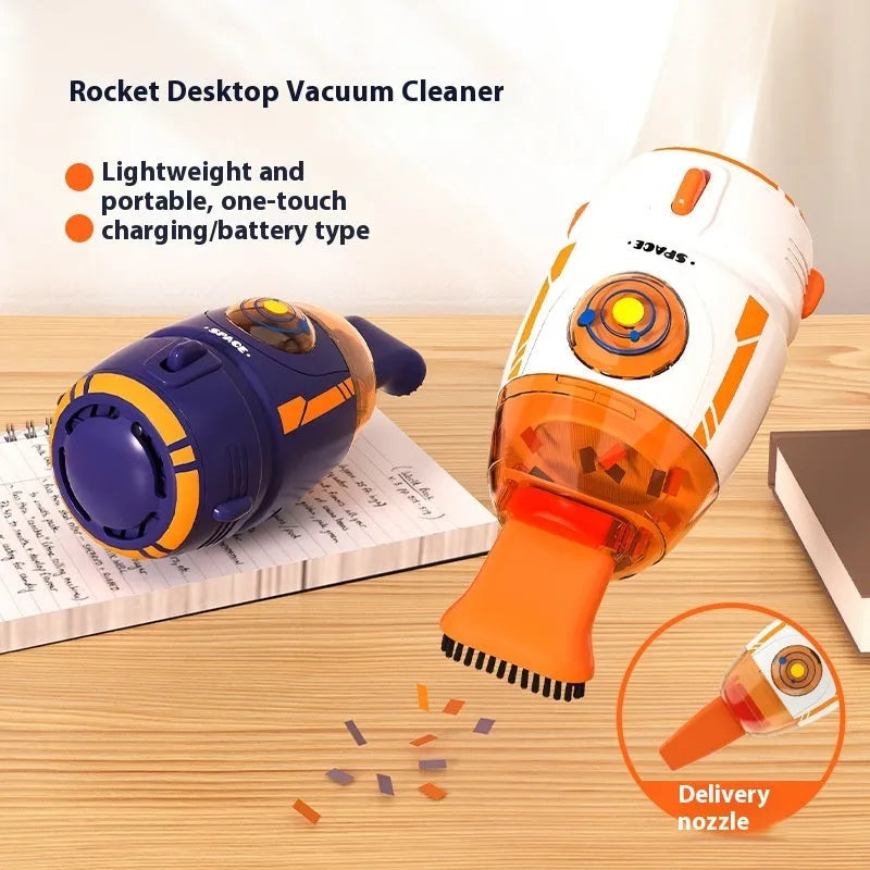 Handheld USB rechargeable desktop vacuum cleaner in a choice of rocket or animal designs on a desk.