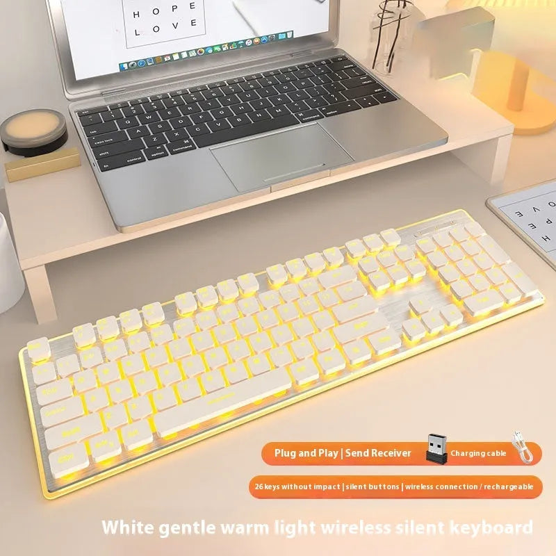Wireless Bluetooth keyboard with mute button and ice blue backlight in cherry blossom pink colour