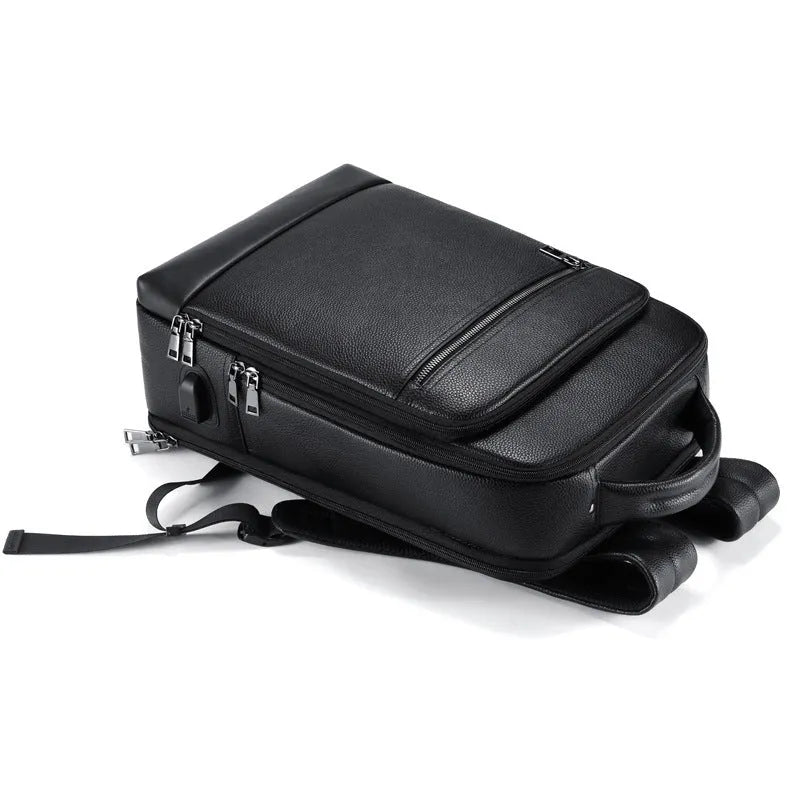 Black genuine leather men's business backpack with curved straps and sewing line detailing
