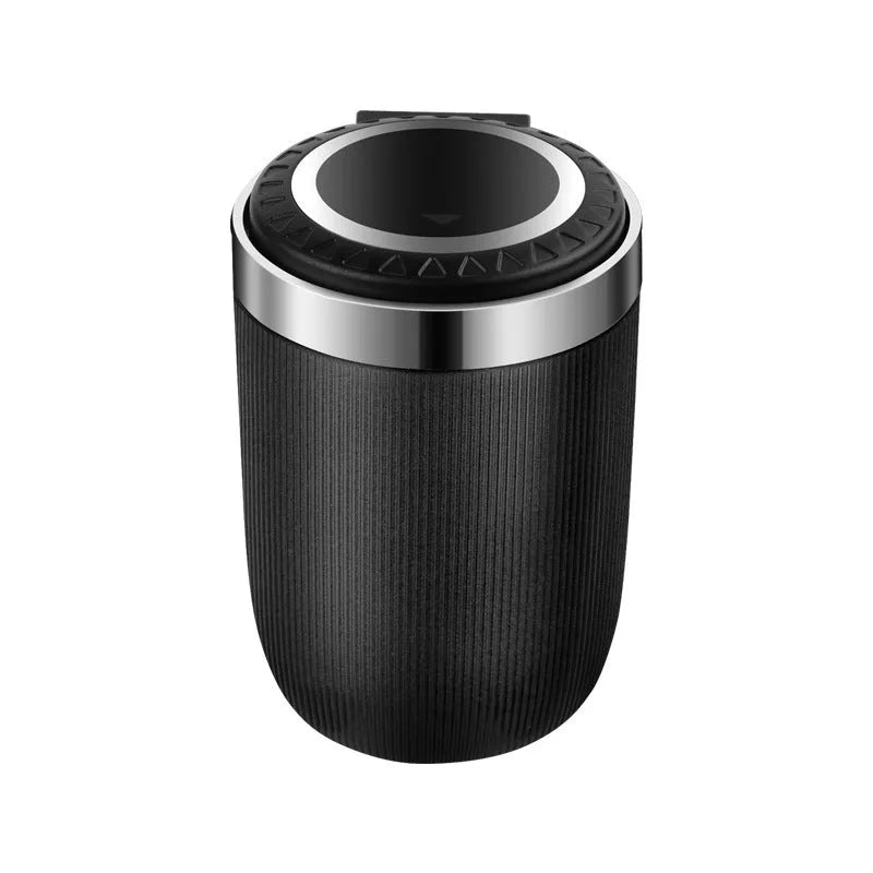 Metal ABS car ashtray with cover and blue LED light against a dark background