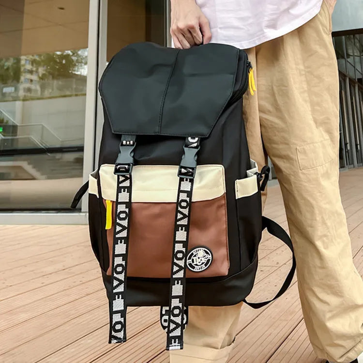Oxford cloth backpack in black, green, or red, showing handheld and shoulder straps