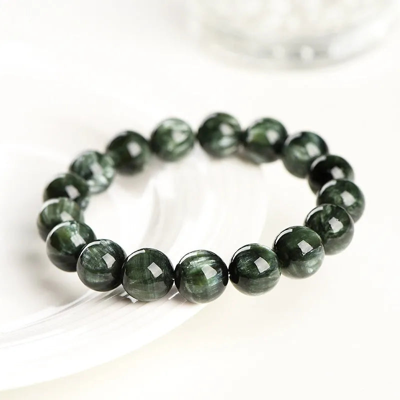 Natural green dragon crystal bead bracelet with geometric 8-9mm beads and Ruyi decoration.