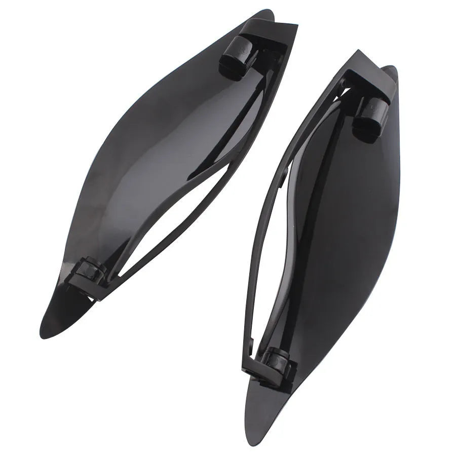 Black smoked ABS windshield side wing for a Harley Davidson three-wheel Glide motorcycle.