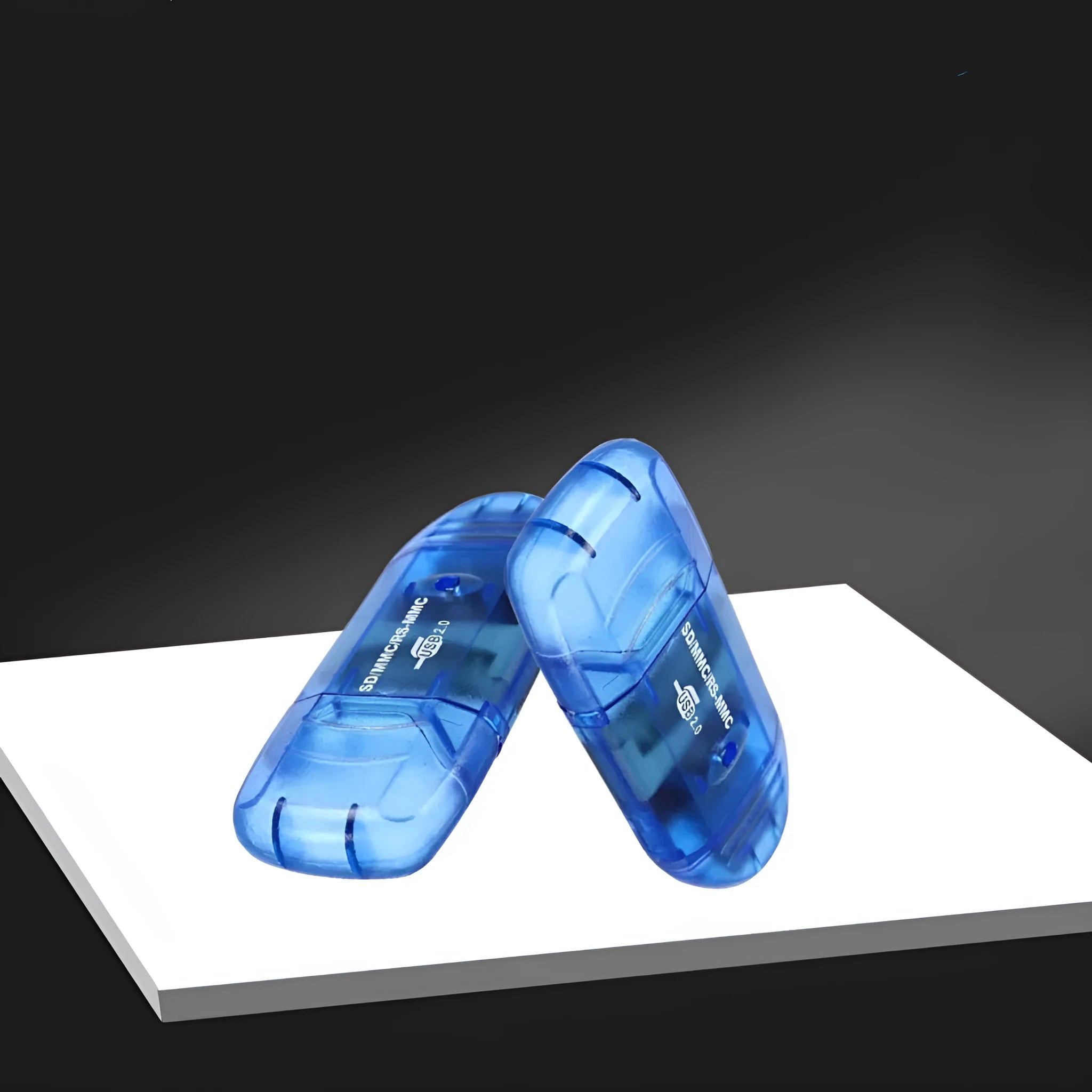 Transparent USB card reader for SD and MS memory cards with optional LED light, shown with card holder.