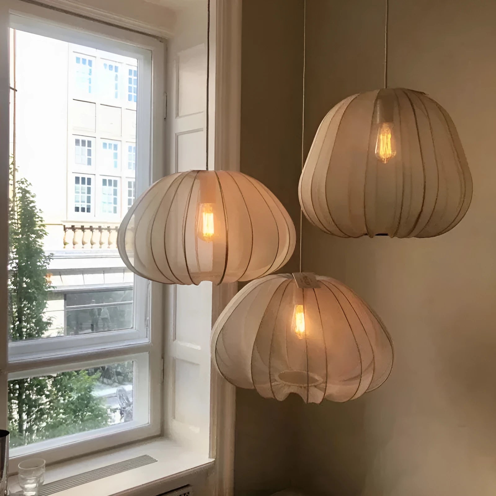 Japanese-style net pumpkin shape ceiling light with iron branch design in grey blue or white finish.