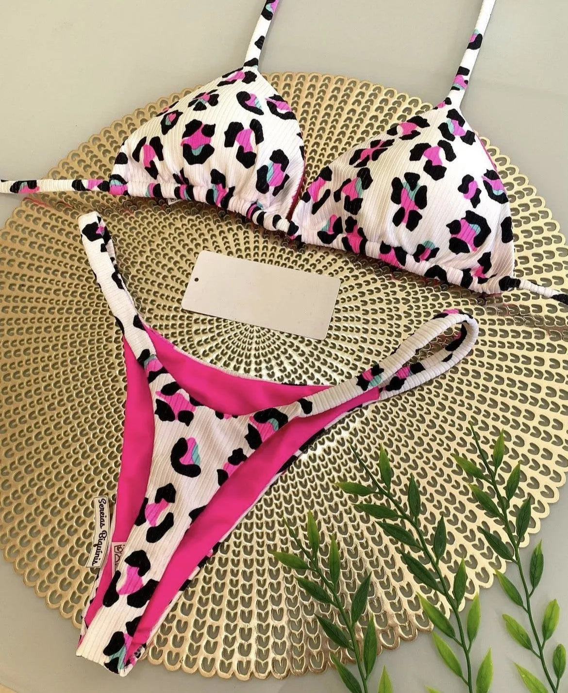 Women's printed bikini swimsuit with briefs style on a mannequin