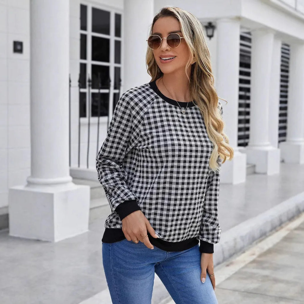 Black Japanese plaid pattern long sleeve polyester sweater showing front view with regular sleeves