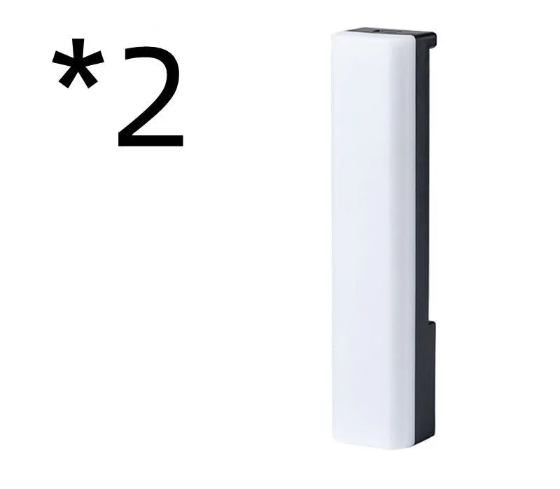 Tall 3D RGB LED ambience lamp with colourful lights on a desk, showcasing its voice-activated music rhythm mode.