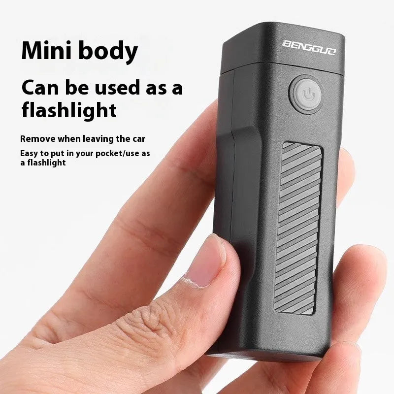 Black USB rechargeable bicycle headlight with quick-release strap mount on handlebars