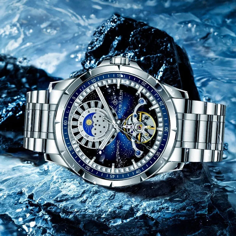 Men's silver alloy automatic watch with blue dial on a stainless steel strap featuring a butterfly clasp