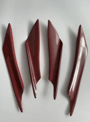 Set of four ABS plastic automotive bumper blade spoilers in carbon fibre finish