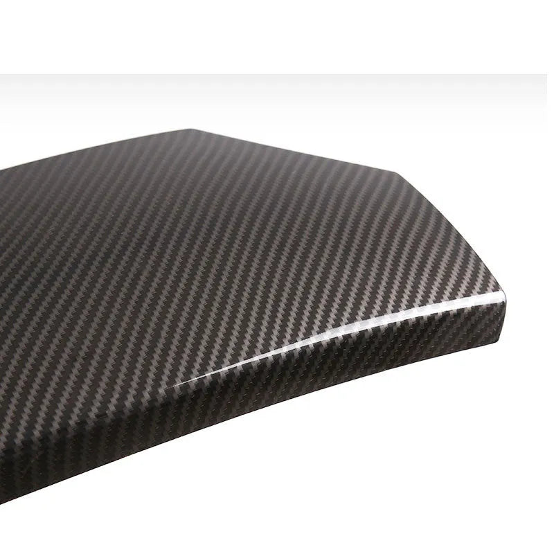 Three black ABS armrest protective covers with carbon fibre pattern for car centre console