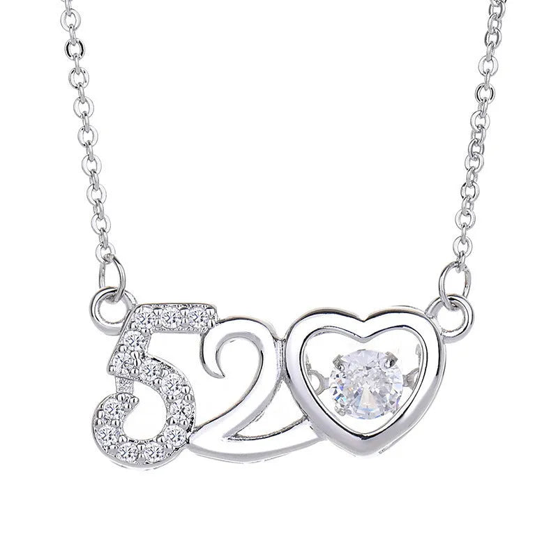 Sterling silver love heart necklace with crown and bow detailing pendant