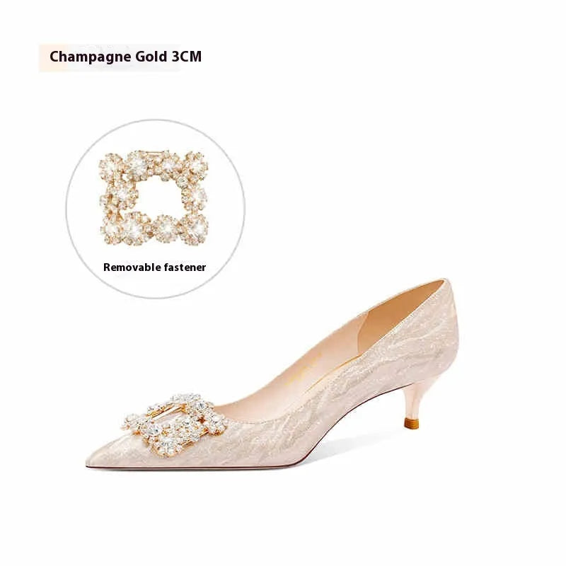 Champagne gold pointed toe stiletto high heel pumps with slip-on closure on a plain background.