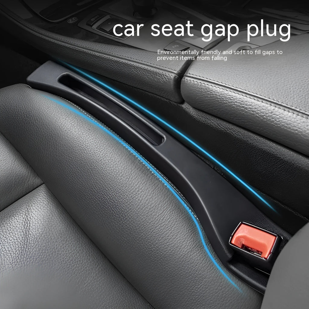 Black plastic car seat gap storage organiser box with handle inserted between car seat and centre console.