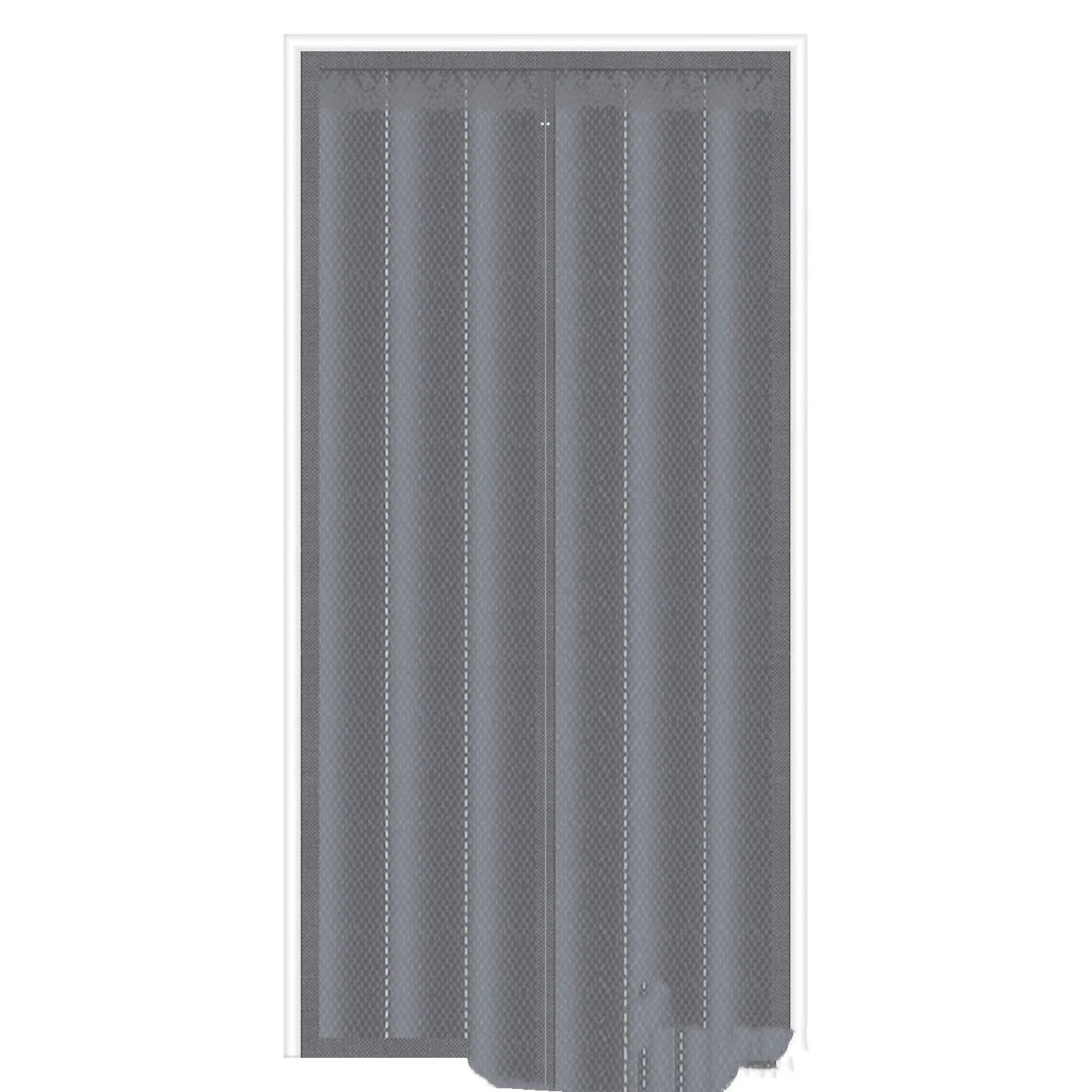 Full seam long magnetic strip cotton door curtain in grey diamond lattice pattern hanging in a doorway.