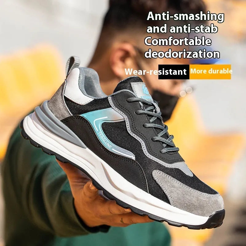 Men's low-top suede and mesh work shoes with a plastic steel toe cap and lace-up closure.