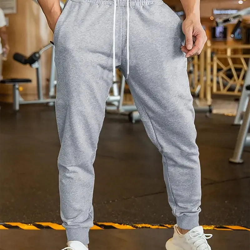 Men's linen leisure trousers with drawstring waist and 3D pattern in polyester fabric