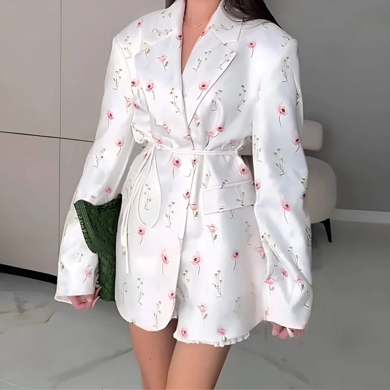 Women's white suit jacket with lace-up detail at collar and waist, long sleeves, regular fit
