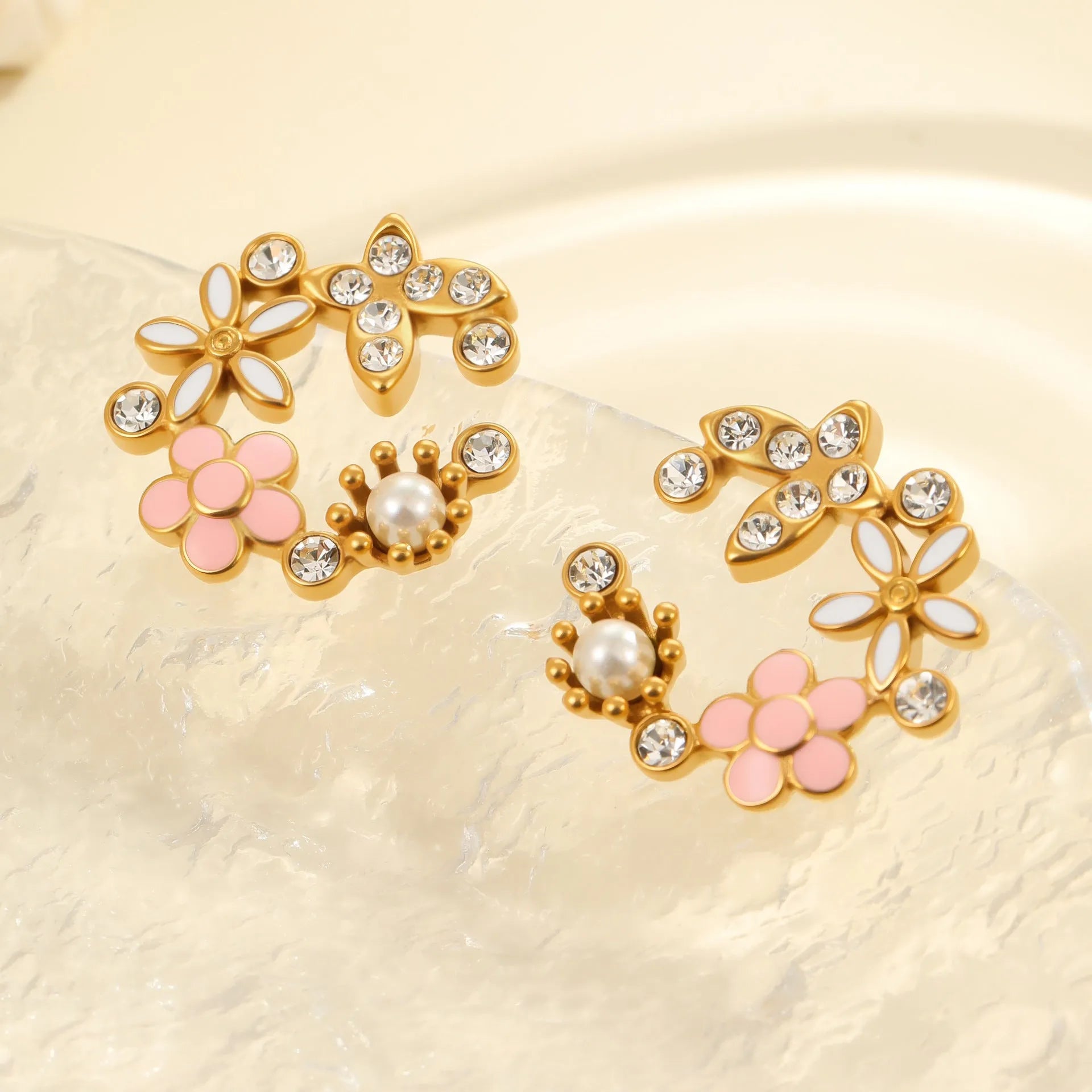 Flower stud earrings with colourful oil diamond finish on petal design, 18K stainless steel construction