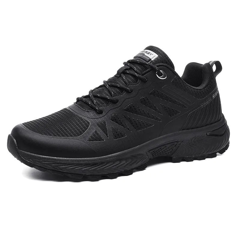 Men's black and orange mesh running shoes with round toe and lace-up front