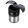Black smart infrared metal car ashtray with lid on a car dashboard.