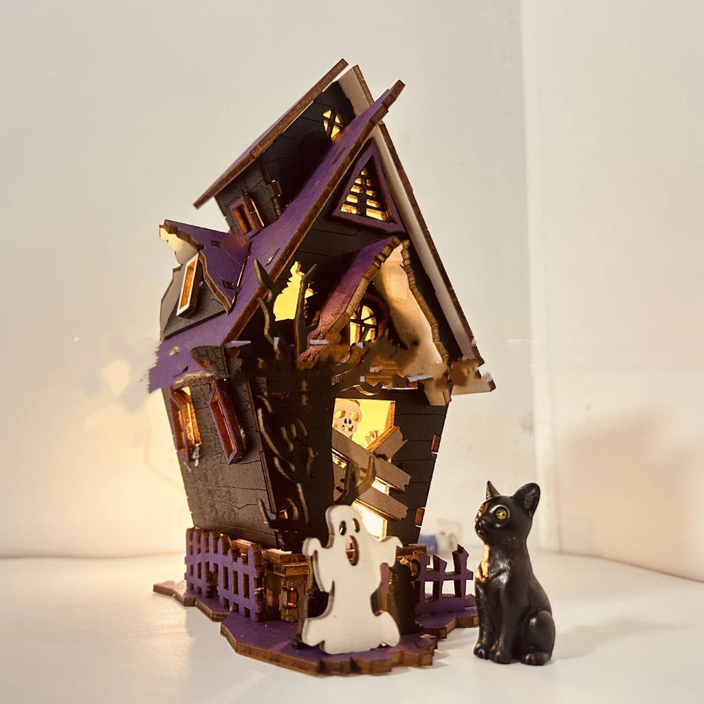 Unassembled DIY wooden haunted house Halloween decoration kit with glowing colour details.