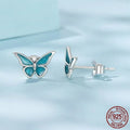 925 sterling silver blue butterfly small ear studs for women with dripping oil colour finish on white background